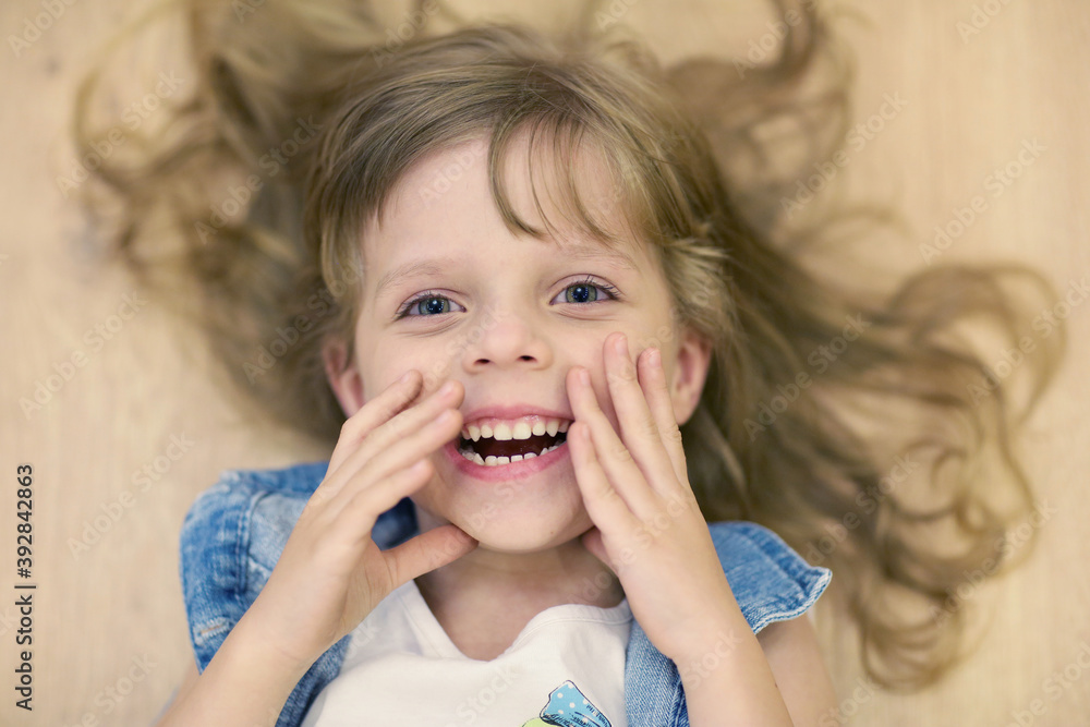 cute little blond baby girl with long curly hair smile laughing cute little blond baby girl with long curly hair smile laughing