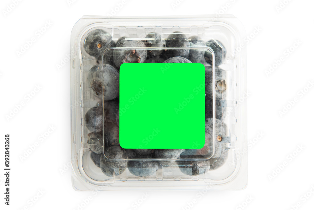 Blueberry in plastic bag isolated on a white background with green chromakey instead of a label Blueberry in plastic bag isolated on a white background with green chromakey instead of a label