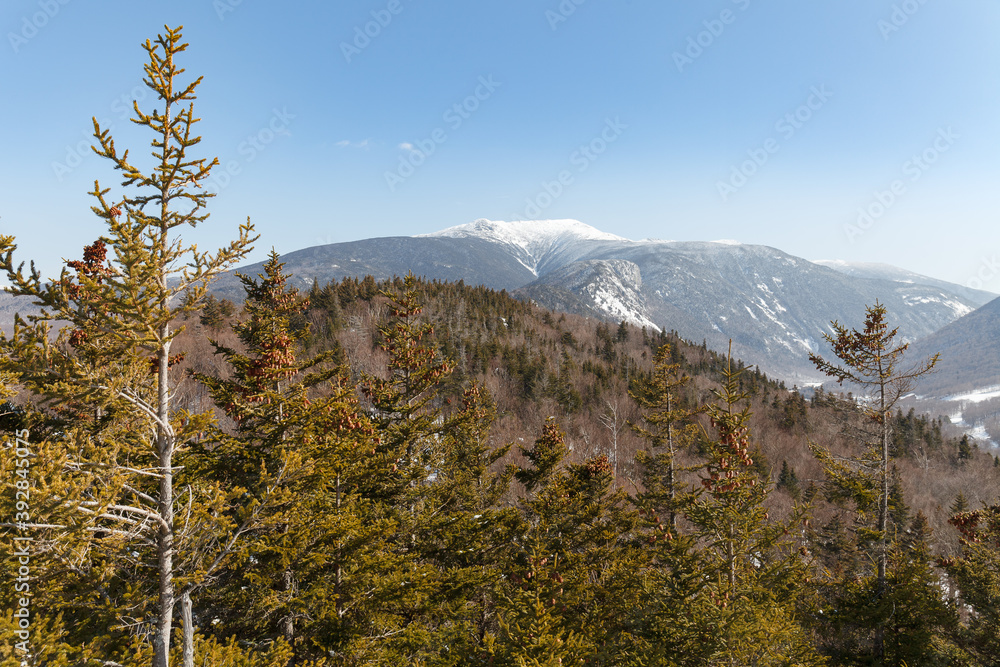 New Hampshire mountains - Cannon and Lafayette, Franconia Notch State Park. Snowy hills and rocks.