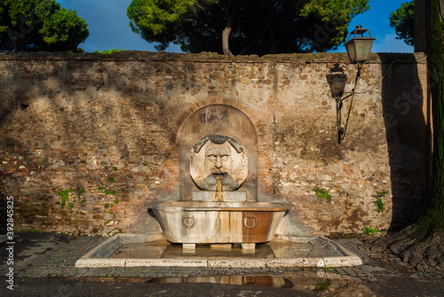 Fountain of the Mask of Saint Sabina, made in 1593 and now in Aventine Hill in Rome photo