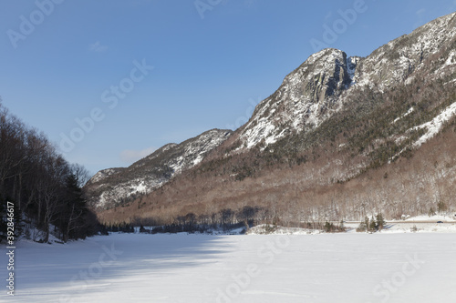 New Hampshire mountains - Cannon and Lafayette, Franconia Notch State Park. Snowy hills and rocks.