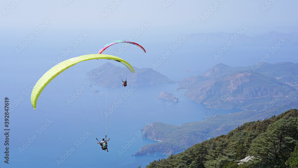 Paragliding in Oludeniz. Parachute in the sky Paragliding in Oludeniz. Parachute in the sky