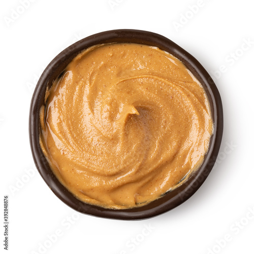 Glass bowl of peanut butter