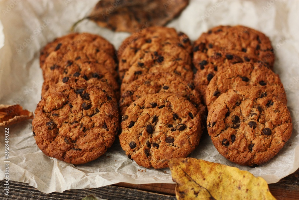 Delicious oatmeal cookies with chocolate on the table Delicious oatmeal cookies with chocolate on the table
