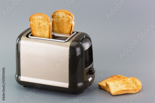 delicious and hot toasted bread toasts in a toaster
