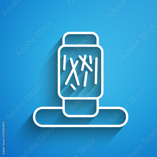 White line Cat scratching post with toy icon isolated on blue background. Long shadow. Vector.