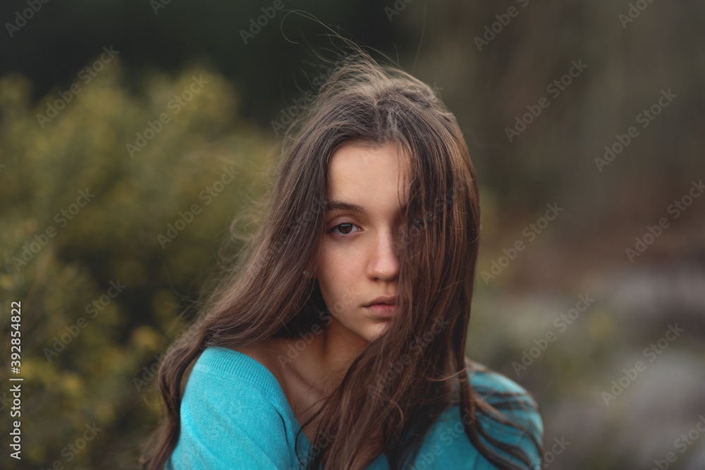 Young girl hair blowing in the wind Young girl hair blowing in the wind