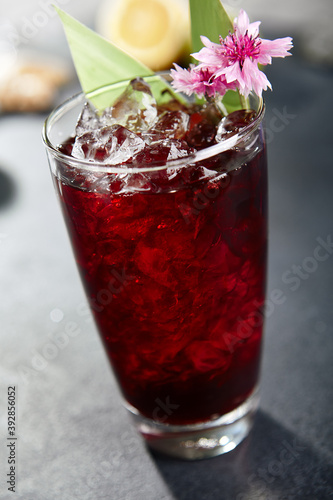 Freshness cocktail with cherry and ice cube