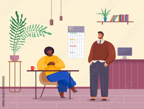 Business meeting colleagues or partners. Businessman chief sitting at a desk in office interior listening to manager s explanation. Male character talking to boss about project management planning