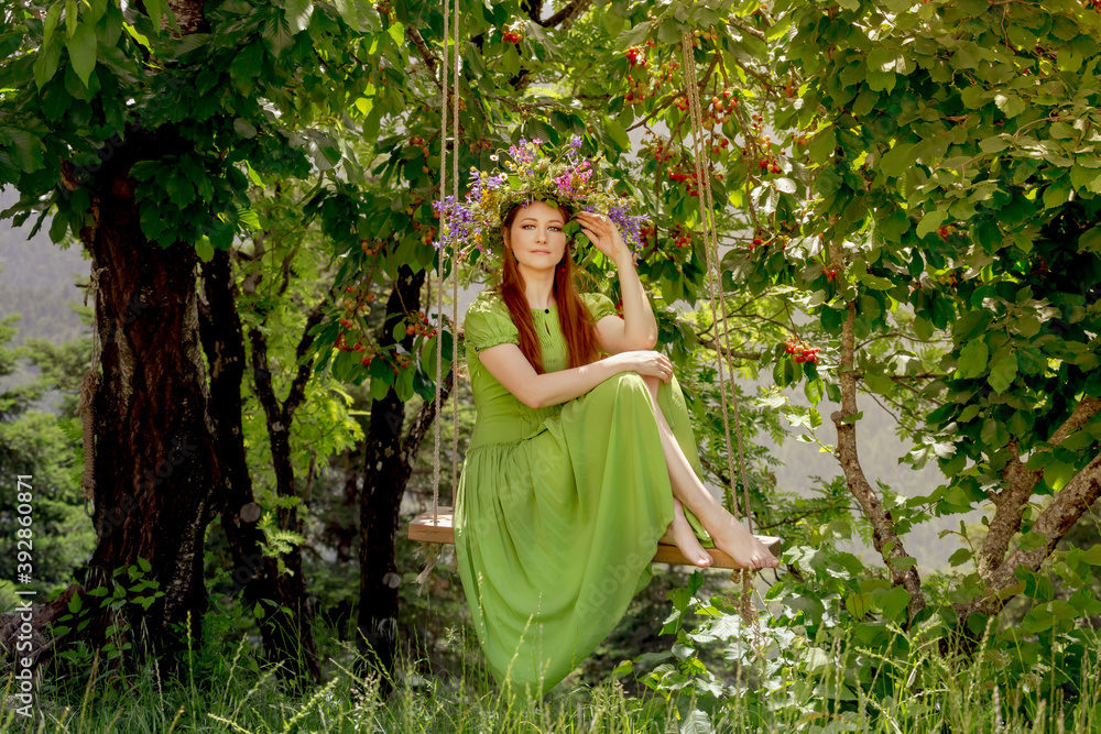 Young girl with a wreath of wild flowers Young girl with a wreath of wild flowers