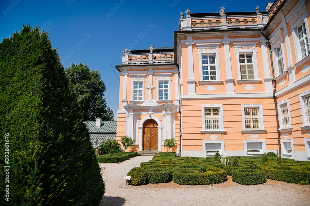Pink Rococo Chateau Nove Hrady, Сastle with French garden called Small Schonbrunn or Czech Versailles near Litomysl in summer sunny day, Pardubice region, Czech Republic