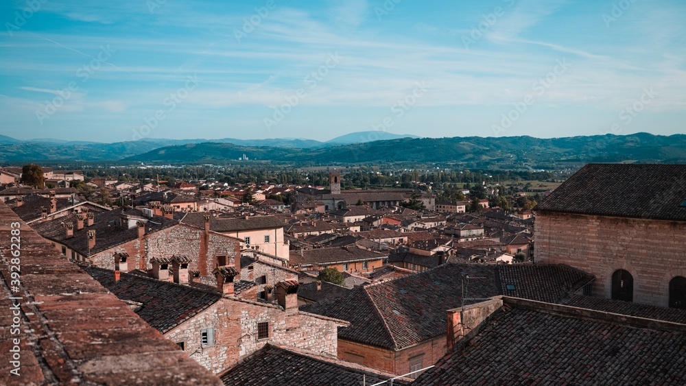 Panoramic view from above of the medieval Italian village of Gubbio with old buildings (Umbria, Italy, Europe)