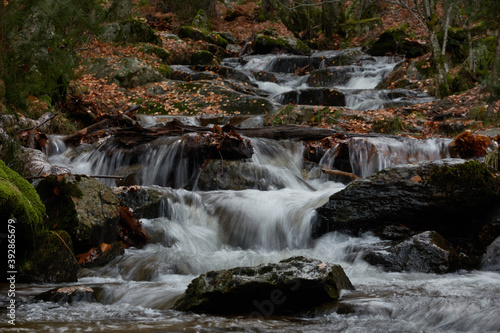 Small waterfalls in the bed of the Sestil de Ma  llo stream. Autumn in the Sierra de Guadarrama National Park. Madrid s community. Spain