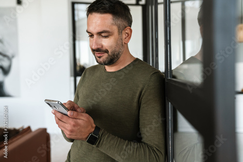 Attractive confident young business man