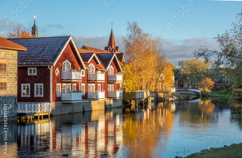 Old tow of Falun with traditional, picturesque, red wooden houses in the city of Falun in Dalarna, Sweded photo