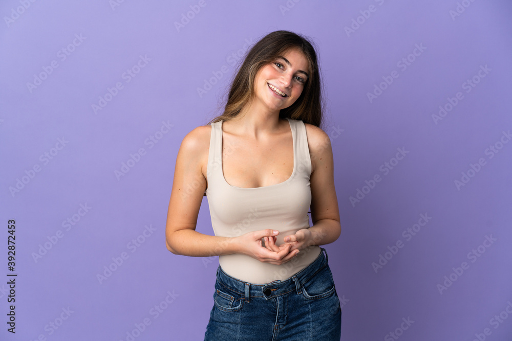 Young caucasian woman isolated on purple background laughing Young caucasian woman isolated on purple background laughing