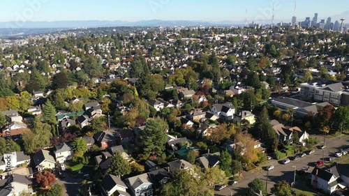 Aerial / drone orbiting footage of Fremont, Interbay, Lawton Park, North Queen Anne, Queen Anne, downtown Seattle, upscale, affluent neighborhoods uptown by Puget Sound, in Seattle, Washington photo