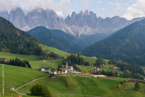 Val di Funes, San Giovanni Church Panorama with mountain at background during the sunset