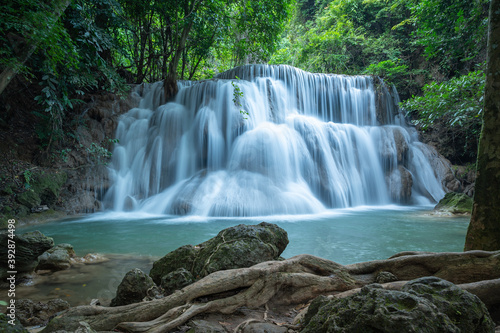Fototapeta Naklejka Na Ścianę i Meble -  Huay Mae Khamin waterfalls in deep forest at Srinakarin National Park ,Kanchanaburi ,A beautiful stream water famous rainforest waterfall in Thailand
