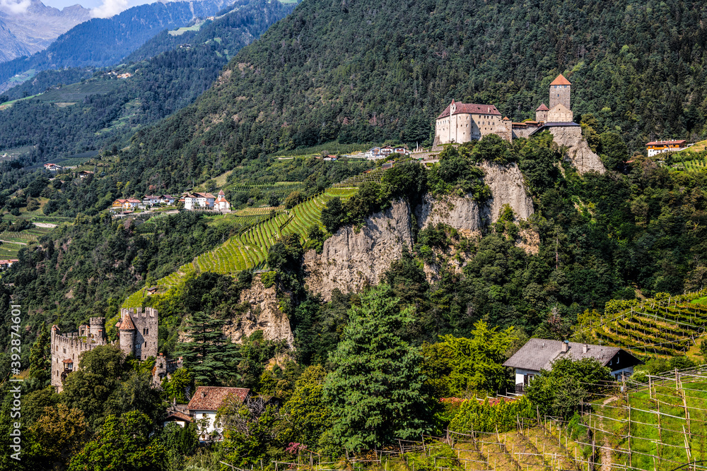 The Brunnenburg castle and Tyrol Castle near Merano, South Tyrol in the town of Tirolo, Bolzano province, Italy.