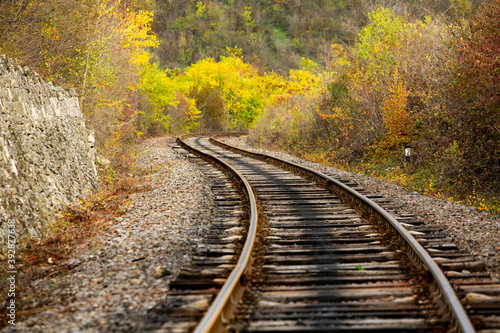 Russian Straight Railway with trees. Landscape with railroad, summer time traveling, freedom of movement.