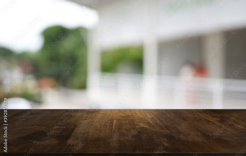 Wood Table Top in Blur Background room interior with empty copy space.