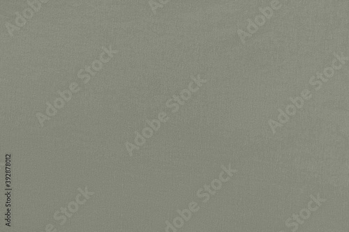 Gray yellow homogeneous background with a textured surface