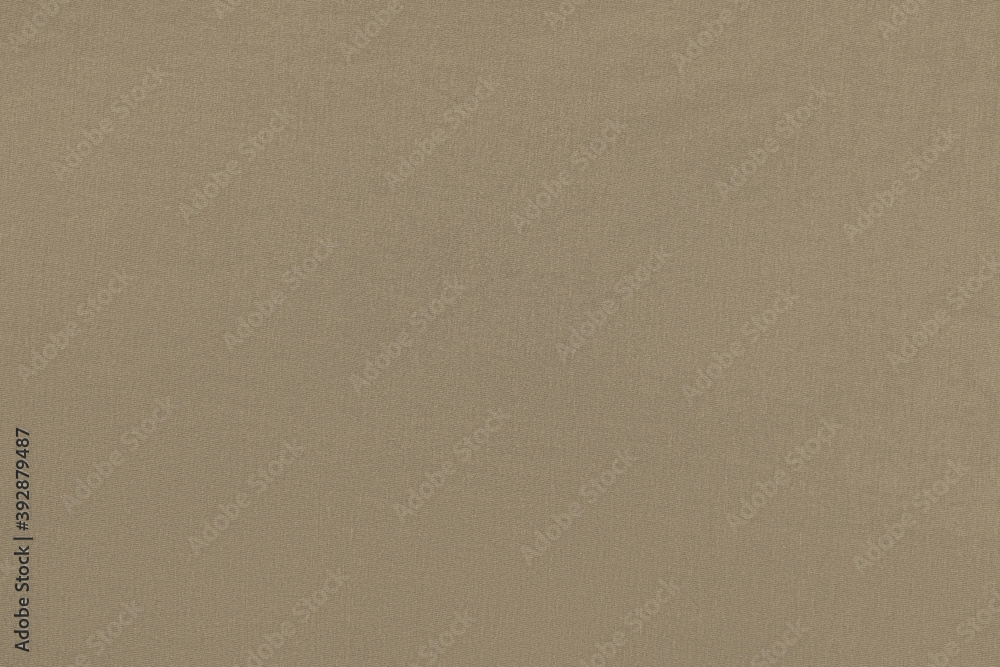 Khaki homogeneous background with a textured surface Khaki homogeneous background with a textured surface