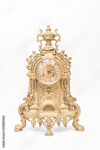 vintage bronze watch on a white background, bronze fireplace clock, golden old desktop clock on a white background, antique clock studio photo, antique bronze clock on a white background