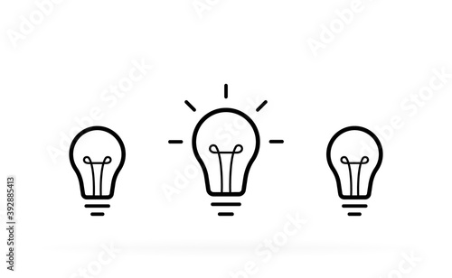 Creative idea. Set of standing light bulbs. Light with rays isolated on white background. Vector illustration