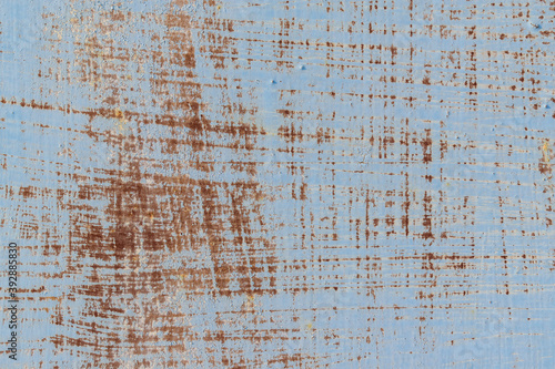 Old paint for the backdrop. Color - light blue, brown. Peeling. Scratches, horizontal and vertical stripes.