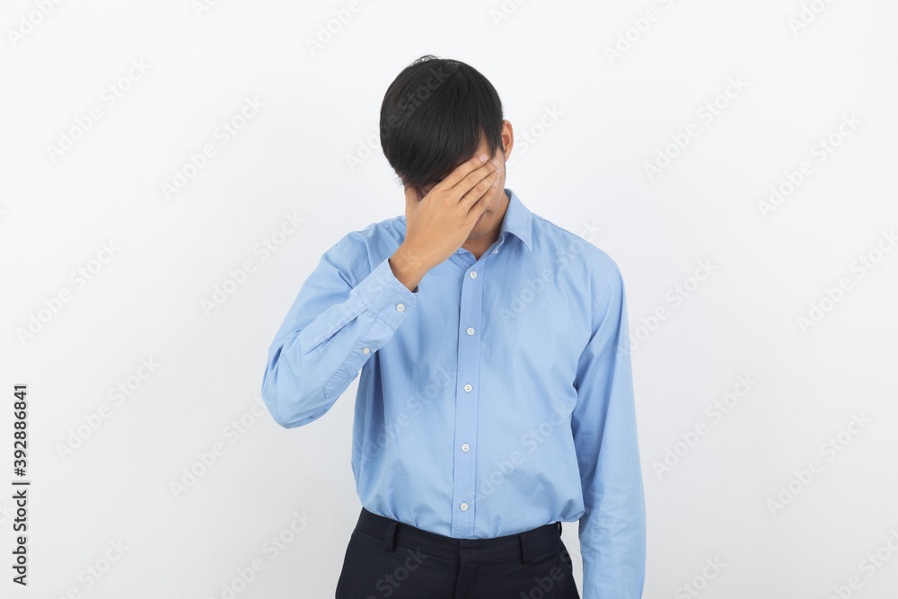 Young asian business man unhappy and frustrated with something. Negative facial expression isolated on white background. Young asian business man unhappy and frustrated with something. Negative facial expression isolated on white background.