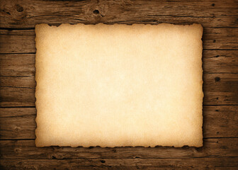 Old parchment with worn edges on a rustic  wood background