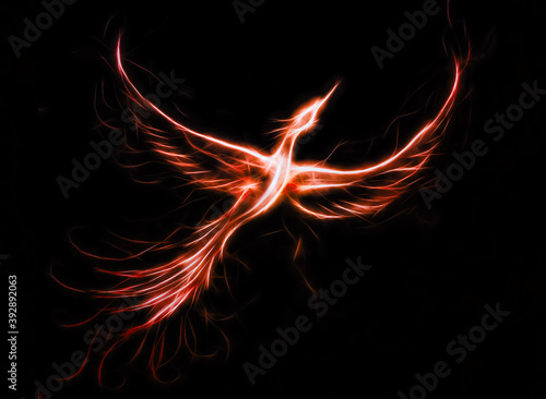 Flying phoenix bird as symbol of rebirth and new beginning. © jozefklopacka