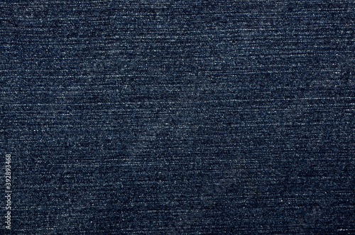Texture of blue jeans fabric for background