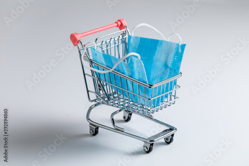 Shopping cart with mask, mandatory wearing masks in store