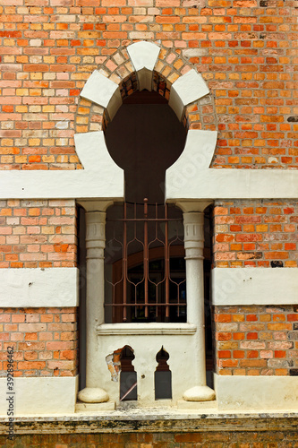 Photography Part of the old brick wall of colonial style building of Panggung Bandaraya DBKL (Malay for DBKL City Theatre) with oriental motifs at Kuala Lumpur, Malaysia
