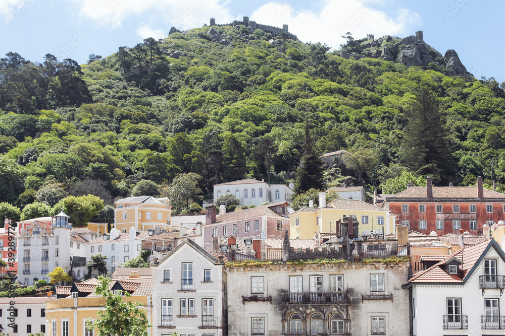 Old buildings, a park and the view over the Moorish Castle in Sintra, Portugal Old buildings, a park and the view over the Moorish Castle in Sintra, Portugal