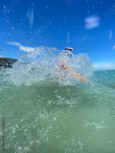 boy in the sea make splash © FranciscoCastro