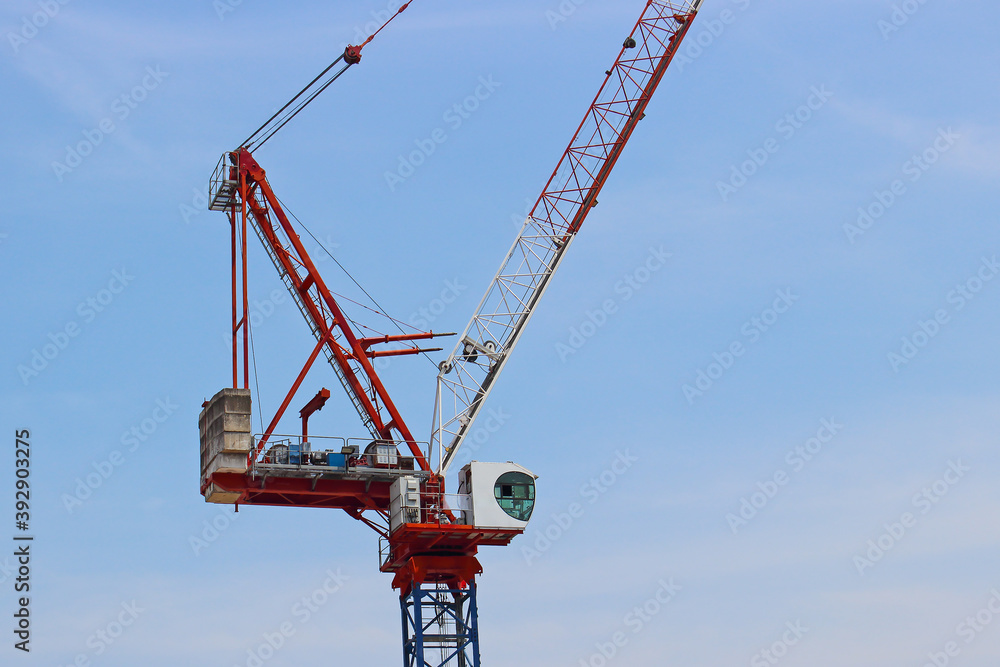 Part of industrial construction crane in the sky background Part of industrial construction crane in the sky background