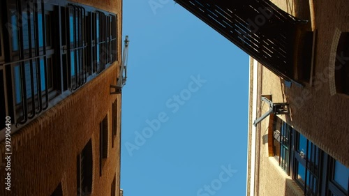 Bottom-up perspective of the Shad Thames, a historic riverside street and iconic venue in the Southbank of London, England, UK photo