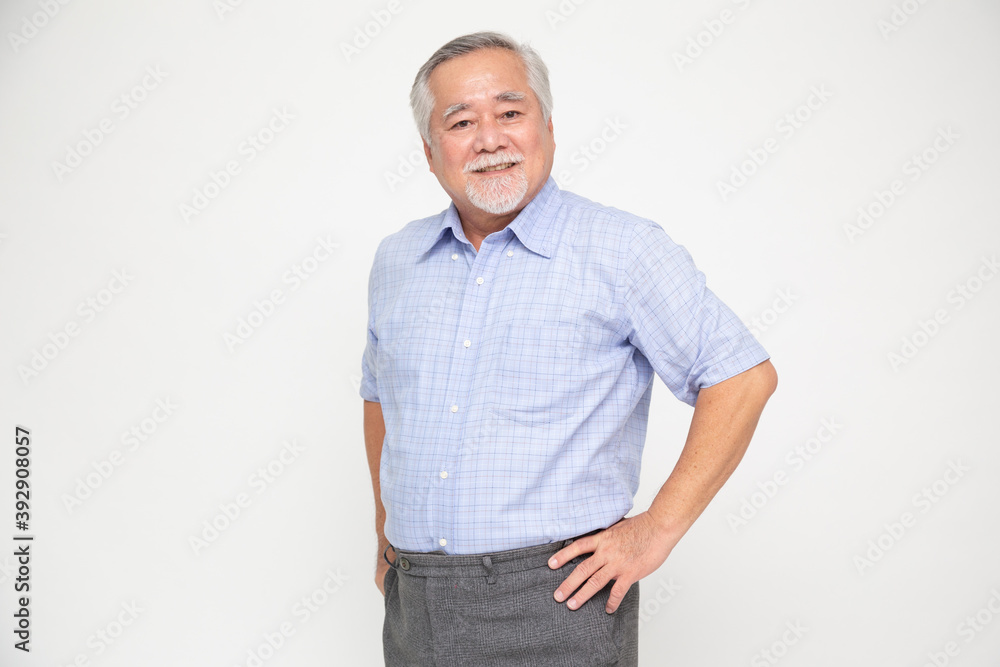 Portrait of senior asian man smile isolated over white background, Mature businessman smiling and looking at camera, Happy feeling concept Portrait of senior asian man smile isolated over white background, Mature businessman smiling and looking at camera, Happy feeling concept