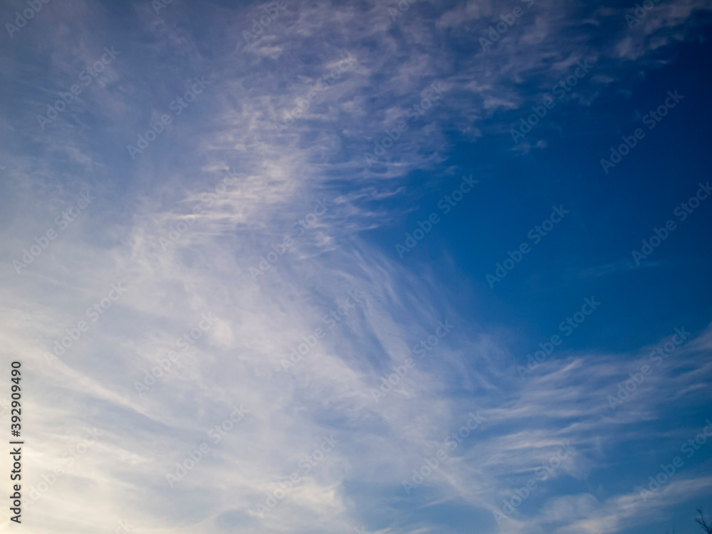 Blue sky background with white transparent clouds. Blue sky background with white transparent clouds.