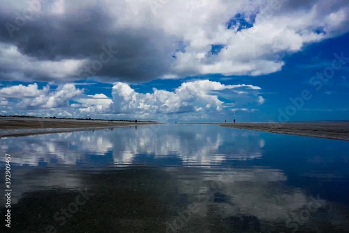 Fototapeta Naklejka Na Ścianę i Meble -  Reflection of Clouds Over Tidal Pool