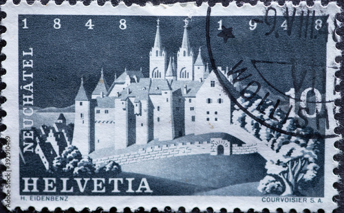 Switzerland - Circa 1948 : a postage stamp printed in the swiss showing Neuchâtel Castle celebrates the federal states' century