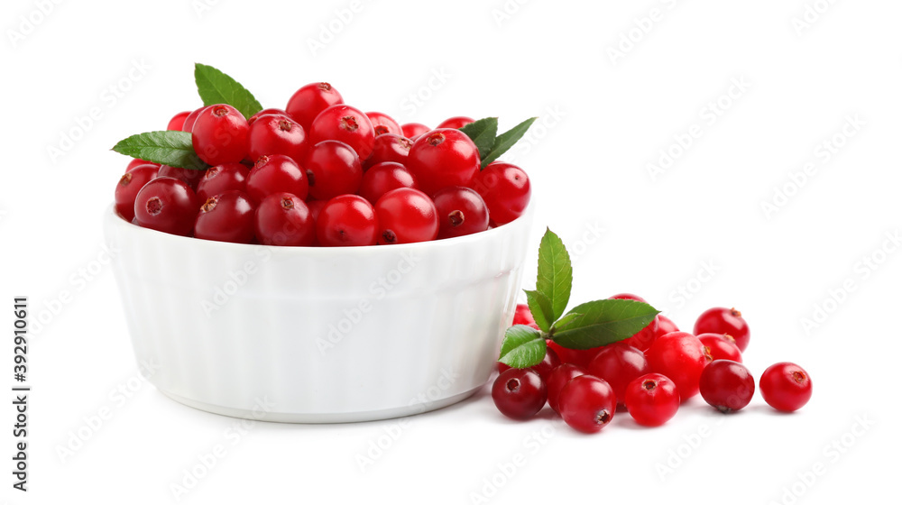 Fresh ripe cranberries with leaves on white background Fresh ripe cranberries with leaves on white background