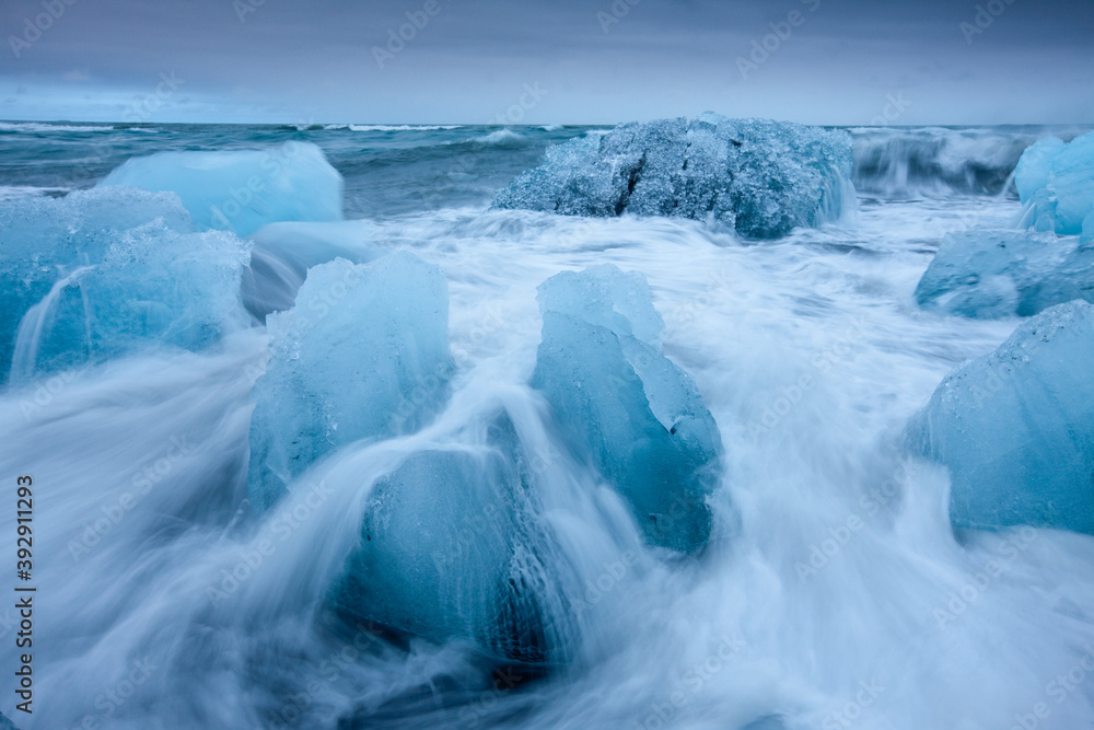 Icebergs in Surf by Jokulsarlon, Iceland Icebergs in Surf by Jokulsarlon, Iceland