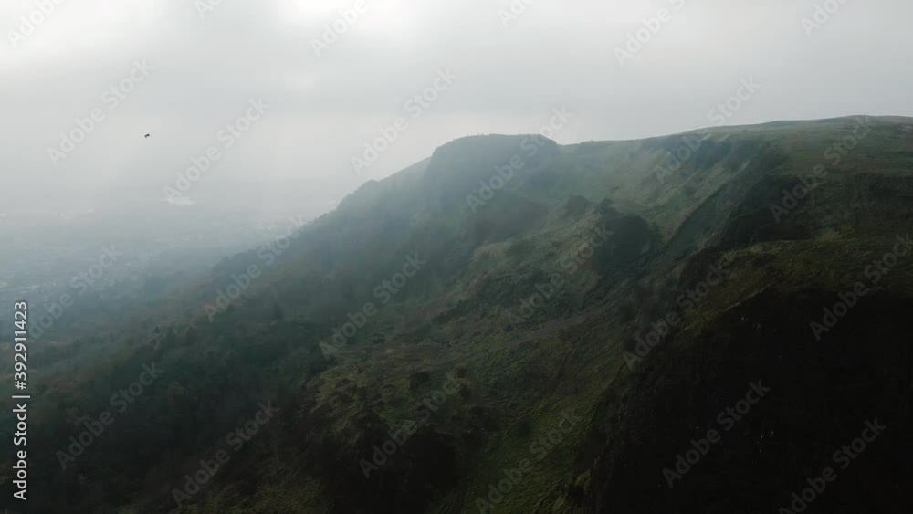 Rotating aerial view of Cavehill, Belfast in foggy conditions Rotating aerial view of Cavehill, Belfast in foggy conditions
