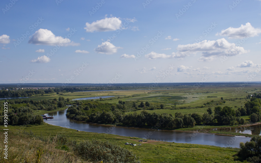 Magnificent natural landscape with forest, field and river Magnificent natural landscape with forest, field and river