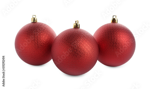 Beautiful red Christmas balls on white background